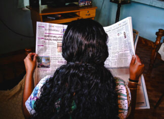How news value is assessed Photo of woman reading newspaper by Photo by Abhijith S Nair on Unsplash