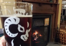 Legal threats – scenario Real ale in front of a pub fire. Image by Media Helping Media released via Creative Commons BY-NC-SA 4.0