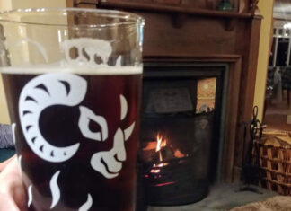 Legal threats – scenario Real ale in front of a pub fire. Image by Media Helping Media released via Creative Commons BY-NC-SA 4.0