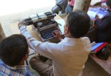 The qualities of a journalist Man working on typewriter, image by Media Helping Media