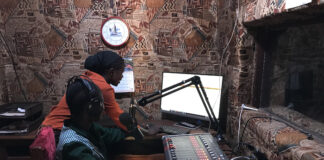 Journalists Bakhita Aluel (seated) and Vivian Nandege at Radio Easter in Yei in South Sudan - image by Jaldeep Katwala
