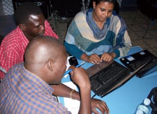 Community radio project plan Sudanese journalist working on a project plan - image by David Brewer of MHM