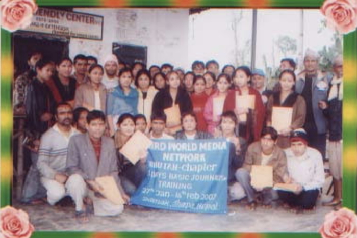 Trainee journalists receiving certificates of achievement - image TP Mishra