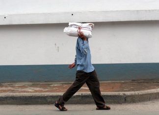 Building a news team from scratch The author delivering copies of The Bhutan Reporter Monthly. Photo/Laura Pohl