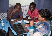 Funding the news – a guide to sustainability Editors from Hurriyat Sudan working on the business model - image by David Brewer of Media Helping Media