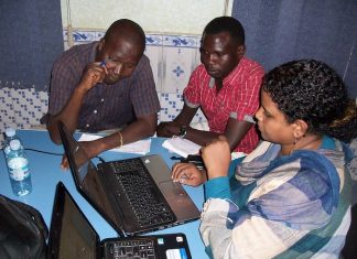 Funding the news – a guide to sustainability Editors from Hurriyat Sudan working on the business model - image by David Brewer of Media Helping Media