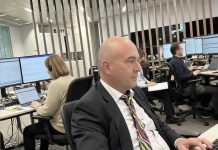 How to be a hands-on editor Image of editor working in a newsroom - created with an original image and Google Gemini AI