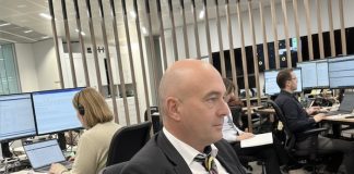 The role of the hands-on editor Image of editor working in a newsroom - created with an original image and Google Gemini AI