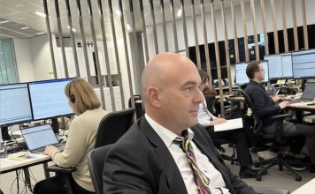 How to be a hands-on editor Image of editor working in a newsroom - created with an original image and Google Gemini AI