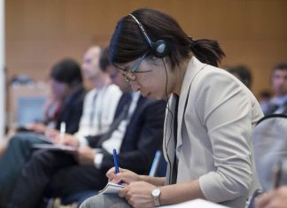 Self-censorship in journalism Image of journalist taking notes by Marco Urban released via Creative Commons BY-NC-ND 2.0