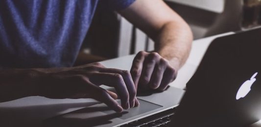 Image of man typing on a computer by Negative Space and released under Creative Commons.