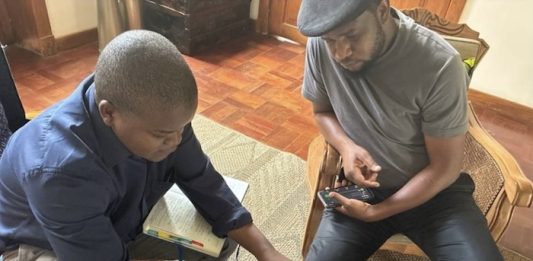 The author, Charles Ngidula (left) - image courtesy Fojo Media Institute