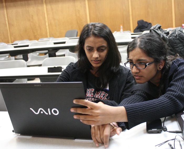 Photo of two women working on a computer by @matylda released via Creative Commons BY SA 2.0