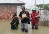 Climate and coastal journalism – crafting compelling stories The author - Rafiqul Islam Montu - with coastal flooding victims